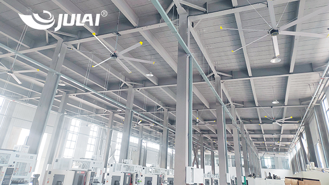 What are the factors that affect the cooling effect of large ceiling fans in factories? 